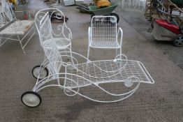 A mid-century metal work sun lounger and two chairs.
