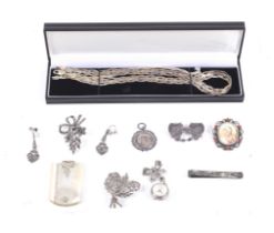 A collection of silver jewellery.