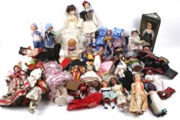 A quantity of 1950s National costume dolls and two larger Dutch dolls. Some with boxes.