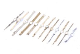 Eighteen various lady's bracelet watches and a gent's Timex digital sports watch.