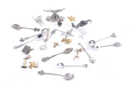 A group of assorted small collectables. Including silver spoons, lead figures, rolled gold, etc.