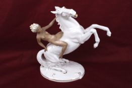 A Schaubach kunst porcelain and bisque nude figure of Lady Godiva riding a horse.