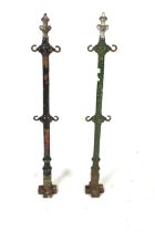 A pair of Victorian cast iron posts.