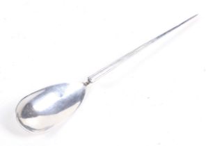 A vintage silver replica of a Roman spoon.