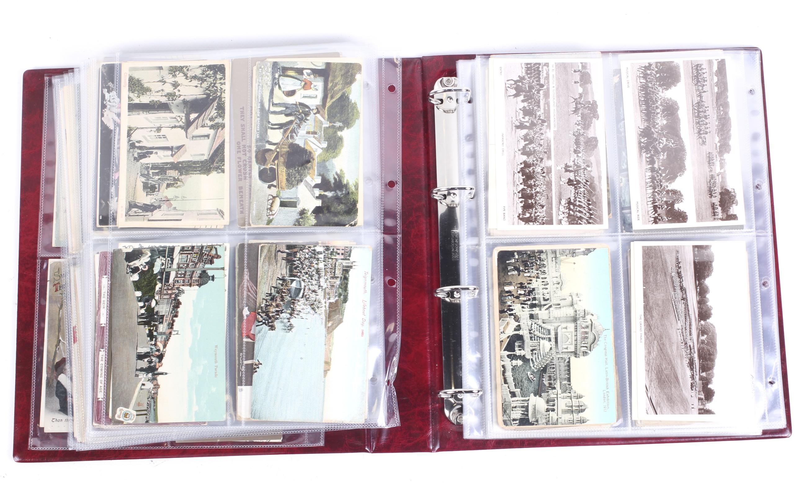 A ring binder album of assorted vintage postcards.