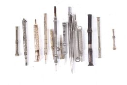 A collection of propelling pencils, pencils, pens and other similar items.