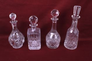 Four Victorian and later glass decanters.