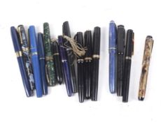 Fifteen various fountain pens.