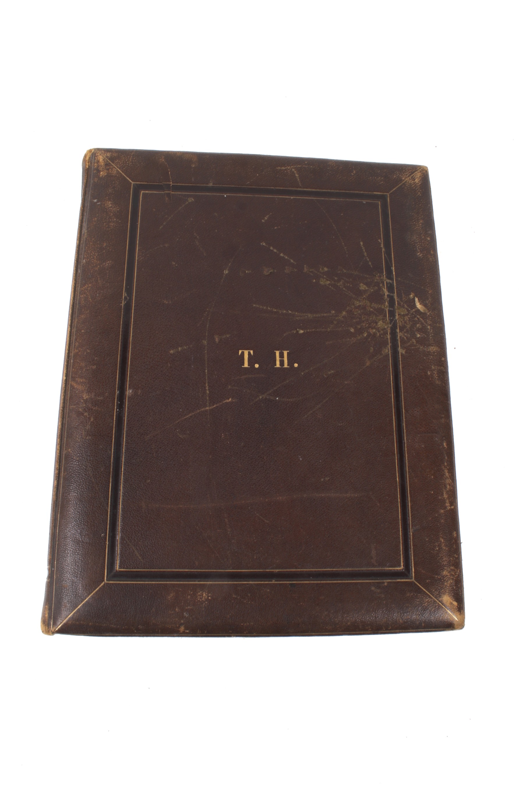 A 19th century large leather bound photograph album and contents. Circa.