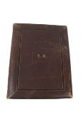 A 19th century large leather bound photograph album and contents. Circa.