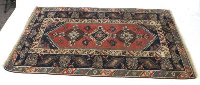 A Turkish Dosemealti hand knotted wool rug.