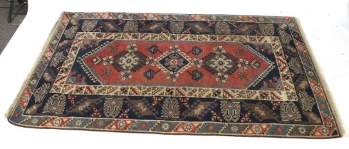 A Turkish Dosemealti hand knotted wool rug.