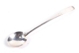 An Arts and Crafts silver condiment spoon.