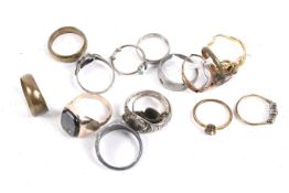 A collection of rings to include an early 20th century gold,