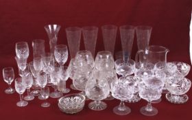 An assortment of drinking glasses. Including wine glasses, beakers, spirit glasses, etc.