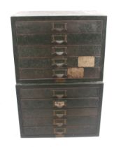 A pair of 20th century table top sets of drawers.