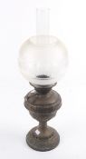 A Victorian oil lamp.