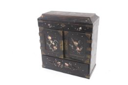 A vintage Japanese lacquer table cabinet jewellery box.