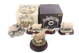 Four Border Fine Arts sheep models. Some on wooden bases. Max.