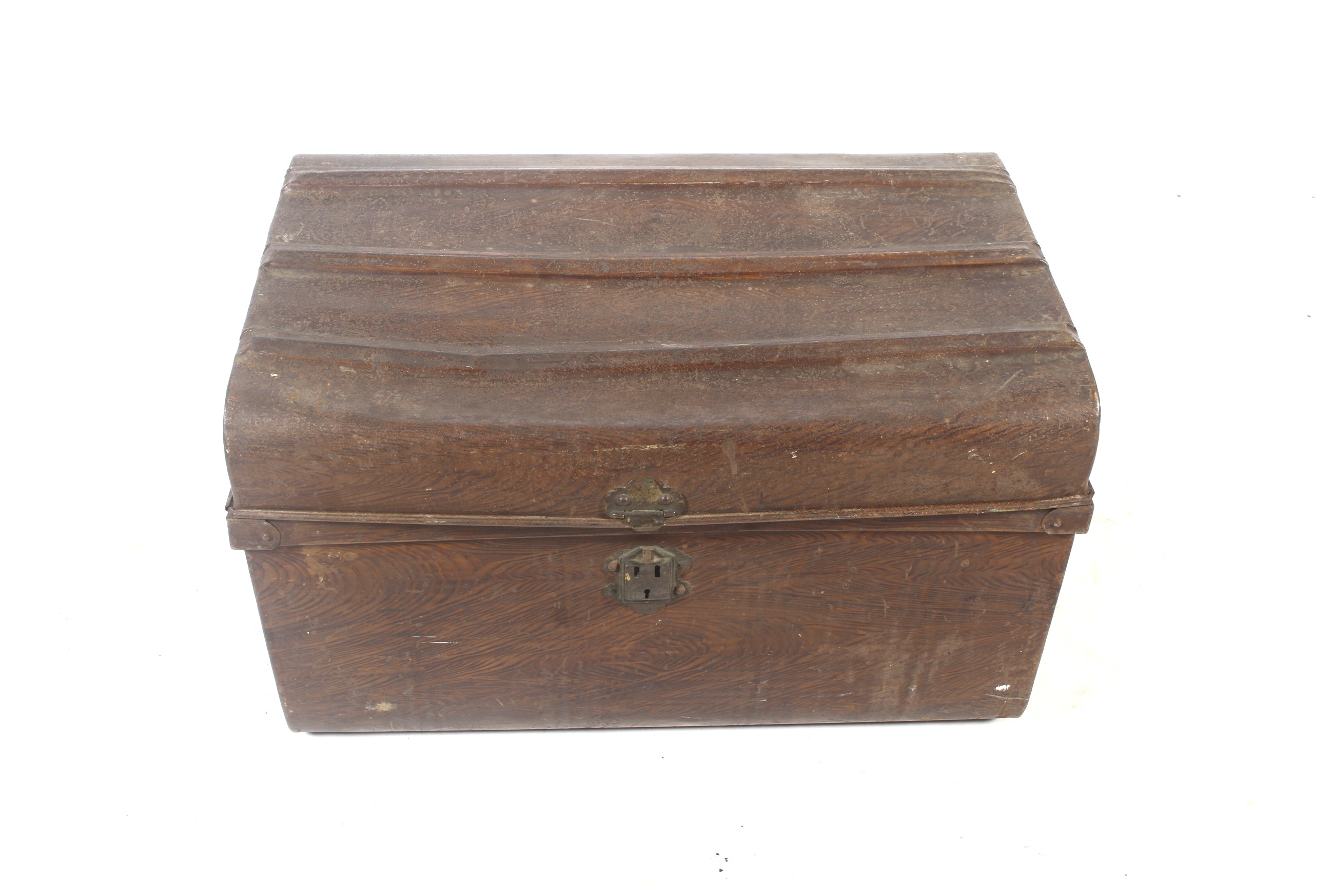 A vintage tin travelling trunk.