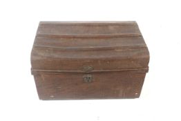 A vintage tin travelling trunk.