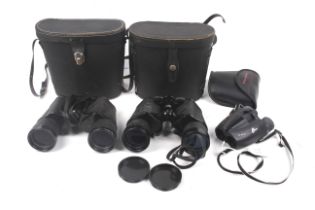 Three pairs of binoculars.