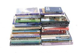 A box of assorted steam railway interest books.
