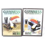 A pair of reproduction Guinness advertising posters.