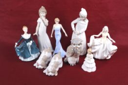Eight porcelain figures.