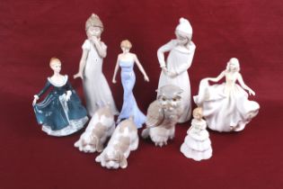 Eight porcelain figures.