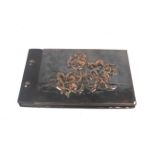 A 20th century copperwork covered photo album.