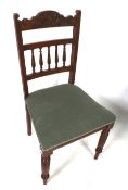 A 20th century mahogany chair.