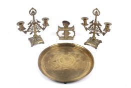 An assortment of 19th century and later brassware.