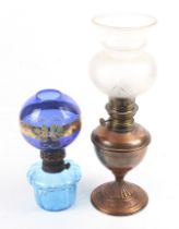 Two vintage oil lamps.