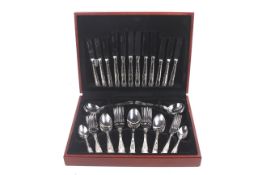 A contemporary 44-piece canteen of cutlery.