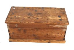 A vintage pine blanket box. With twin handles, on a plinth base, H41cm x W94cm x D47.