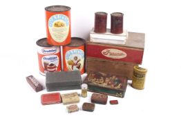 An assortment of vintage tins and advertised packaging.