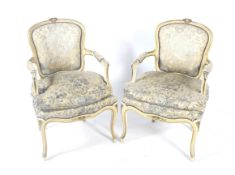 A pair of 19th century Louis XVI style armchairs.