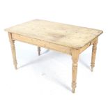 A vintage pine kitchen table.