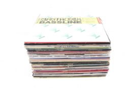 A collection of approximately 47 assorted vinyl records.