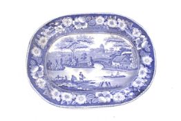 A circa 1830 blue and white printed meat plate in a 'Wild Rose' pattern, possibly Thomas Fell & Co.