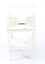 A 20th century painted pine washstand.