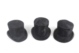 Three 19th century and later gentleman's black silk top hats. Including one by A.J.