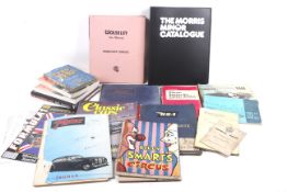 A collection of car and motoring manuals.