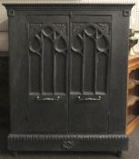 A Gothic style television cabinet.