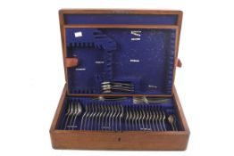 A silverplated old English pattern table service. Comprising mostly forks and spoons.