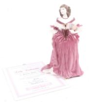 A limited edition Coalport 'Femmes Fatales' ceramic figure. 'Lady Castlemaine', numbered 540/12,500.