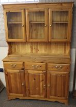 A contemporary pine and glazed kitchen two piece dresser.