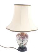 A contemporary Moorcroft ceramic lamp.