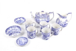 An assortment of Spode blue and white ceramics. Including a teapot, mugs, plates, etc. Max.